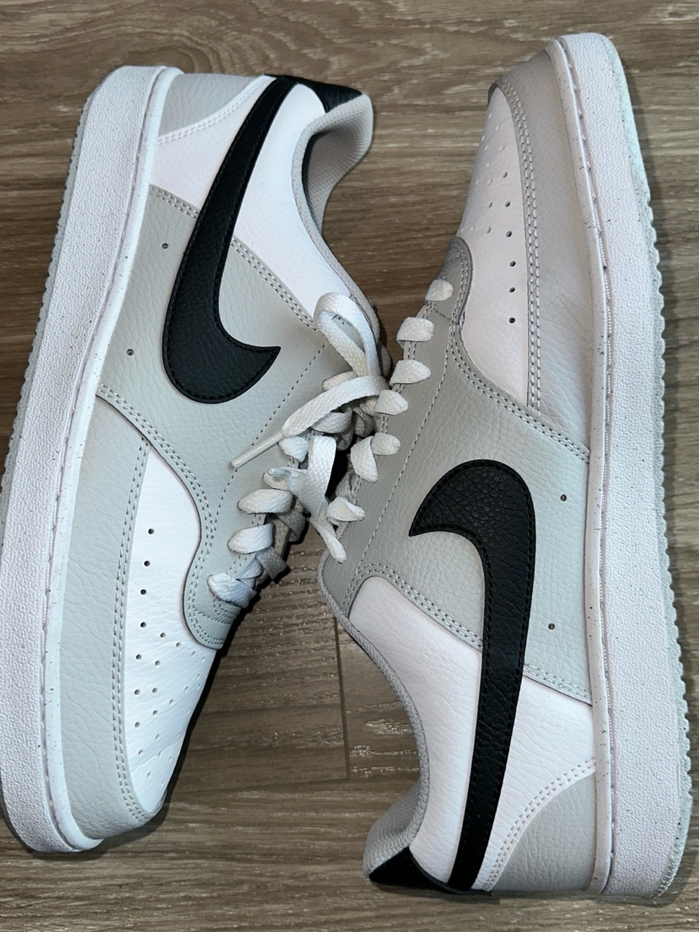 Nike Men’s White and Gray Low-Top Sneakers with Black Swoosh